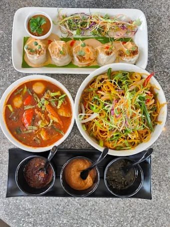 Multi cuisine spread featuring Italian Chinese and Indian dishes at Aristella